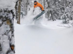 Snowboarder in fresh snow